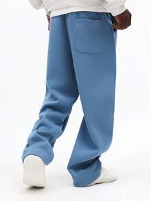 Quần nỉ ống đứng dáng rộng SUMWON với dây rút ở eo và túi bên hông, mang lại sự thoải mái thường ngày. Màu trơn. - Màu xanh lam - Xem 2