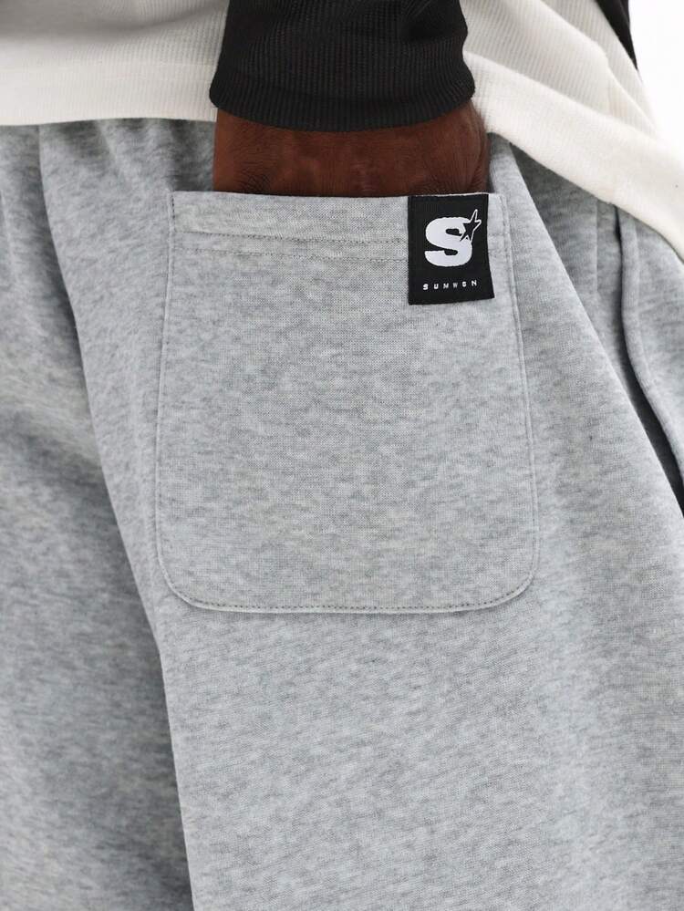 Straight Leg Sweatpants With Cursive Logo