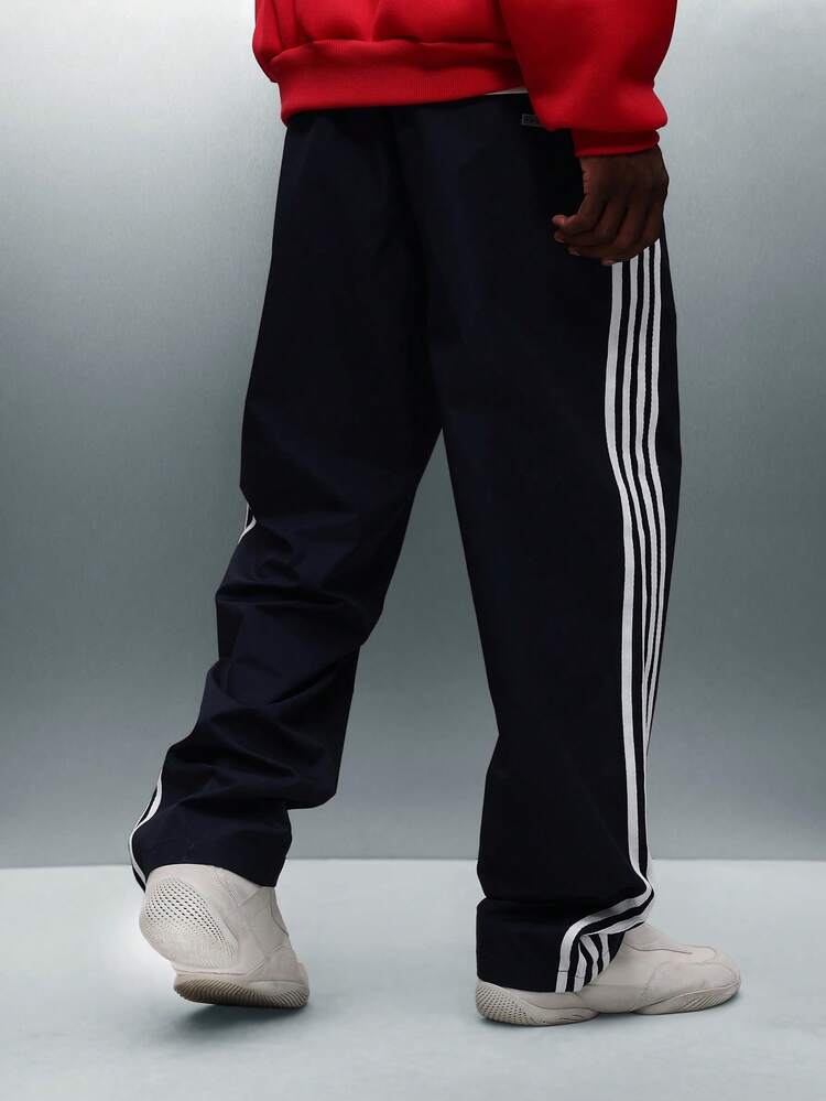 PLAYBOY X SUMWON Calça jogger com logo gravado e listras laterais