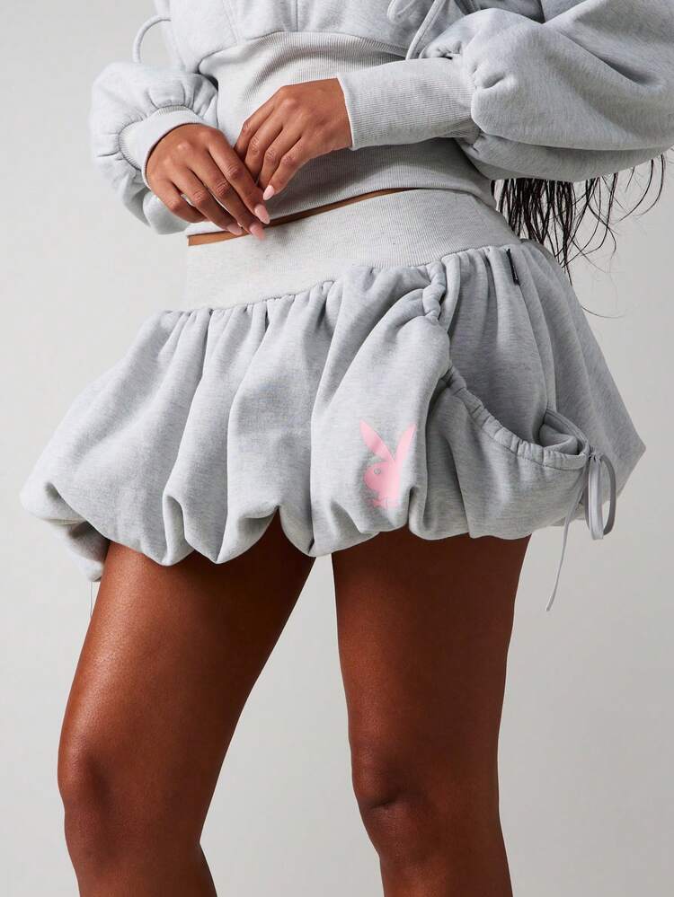Missguided x Playboy Shorts mit Rüschensaum und Kordelzug und rosa Logo