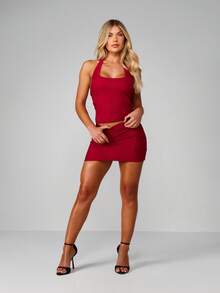 MISSGUIDED Conjunto de dos piezas de top corto de halter de encaje y minifalda ajustado para fiesta, salida nocturna, Navidad