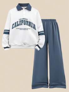 SHEIN 2 件套男童长袖运动套装，白色和蓝色撞色领 Polo 衫，带有“CALIFORNIA”字母印花，营造出美国校园氛围，袖侧蓝白条纹，打造活力外观；海军蓝松紧腰裤，适合学校运动穿着，返校日常穿着，秋季