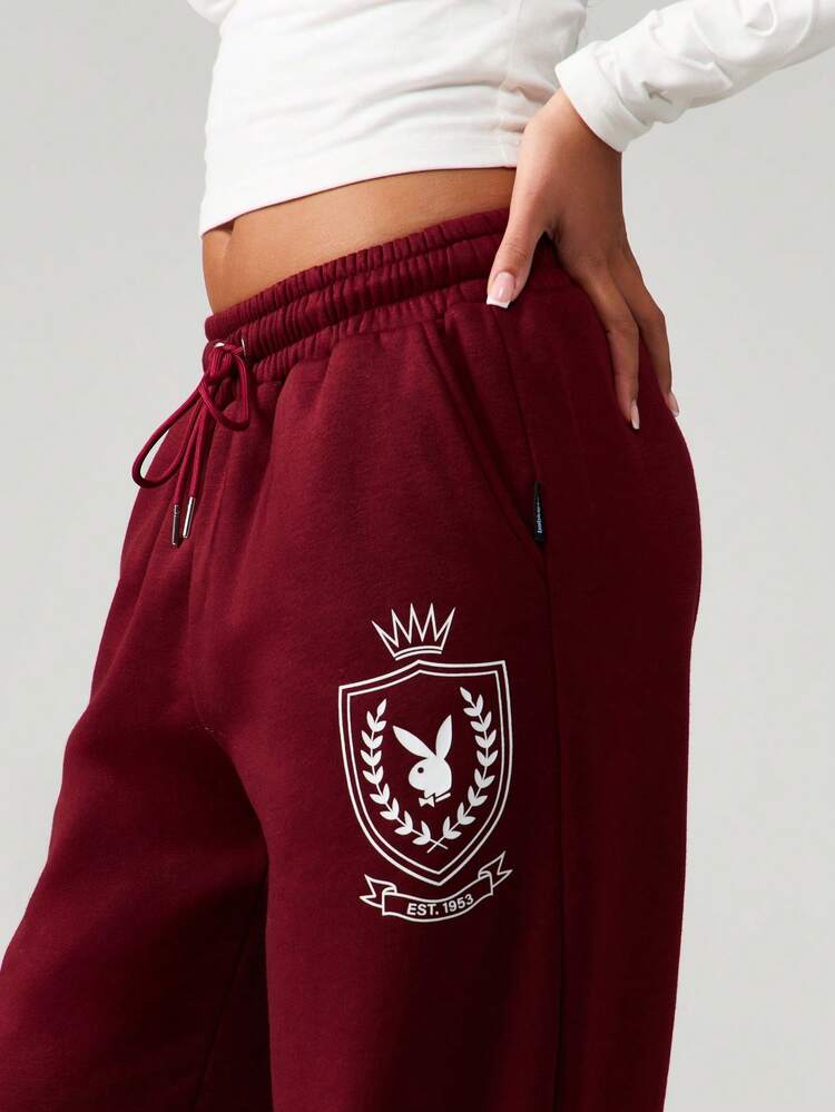 Missguided x Playboy Cuffed Joggers With Logo Emblem And Drawstring Waistband For Casual Winter Comfort