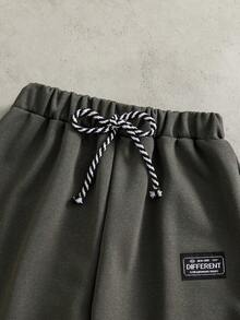 2 件/套时尚白色连帽衫搭配橄榄绿色裤子，适合青少年男孩的时尚服装，连帽衫采用绿色定位印花，面料柔软舒适，适合春秋季穿着，适合上学、郊游等。 - 軍綠色 - 查看 7