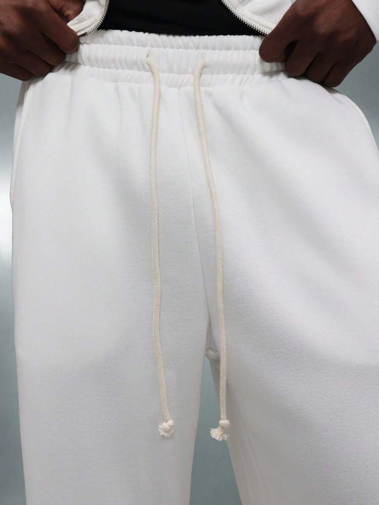 PLAYBOY X SUMWON Drop Crotch Sweatpants With Side Stripes