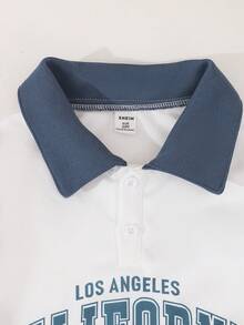 SHEIN 2 件套男童长袖运动套装，白色和蓝色撞色领 Polo 衫，带有“CALIFORNIA”字母印花，营造出美国校园氛围，袖侧蓝白条纹，打造活力外观；海军蓝松紧腰裤，适合学校运动穿着，返校日常穿着，秋季