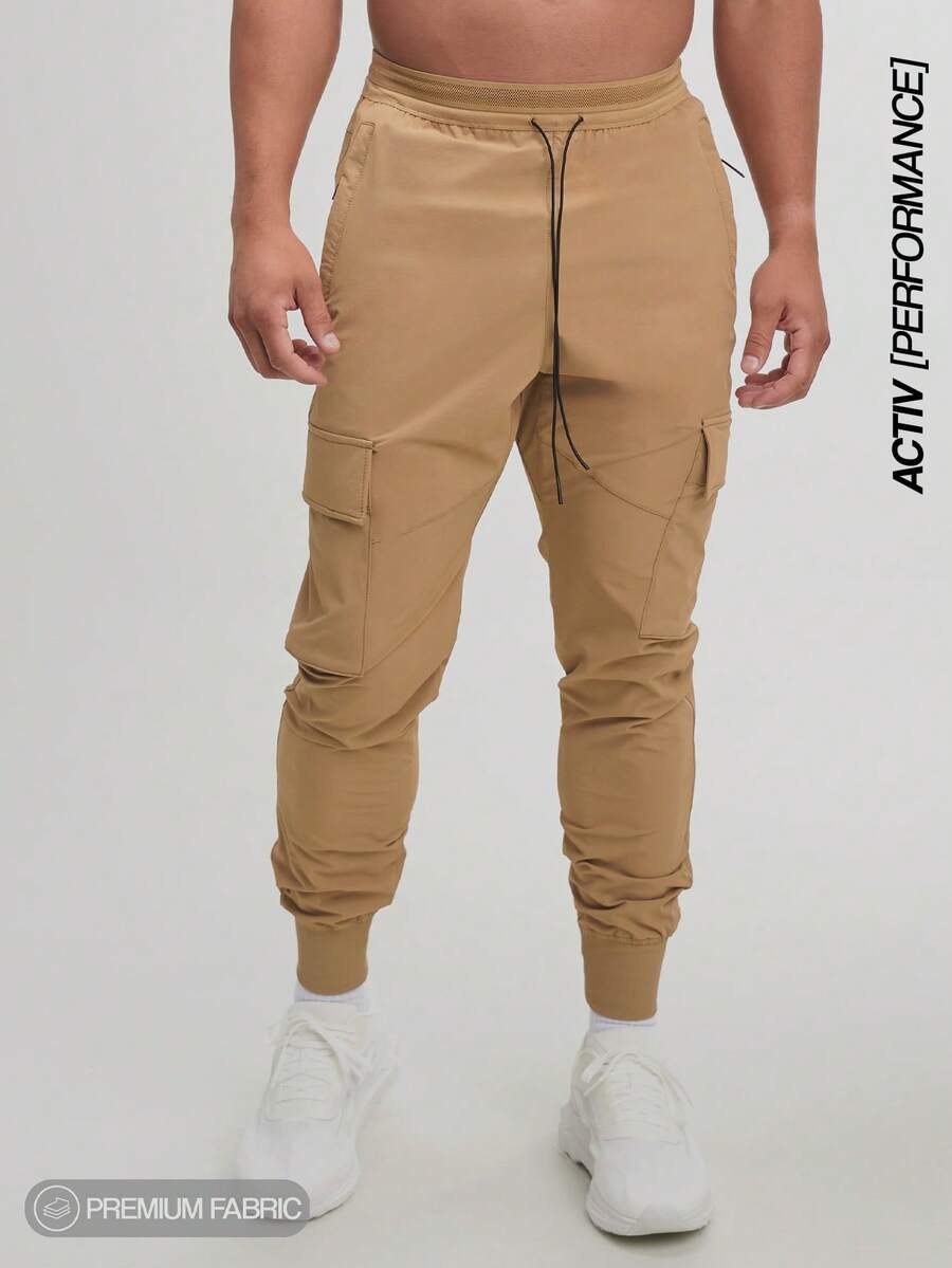 Pantalones cargo de entrenamiento con tela CloudTouch de confort todo el día y resistentes al agua de la colección ARC Workout Training Fashion - Marrón - Ver 1