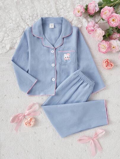 Set de 2 piezas de pijamas casuales y cómodos para niñas con pantalón largo y manga larga en color rosa coral con bordado de cerezas