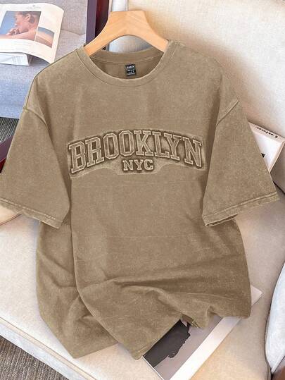 Manfinity Joysei Plus Size Men's Solid Color Vintage Round Neck Drop Shoulder Casual Embossed Snowflake T-Shirt