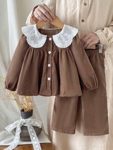 SHEIN 2pcs/Set Baby Girl Infant Toddler Newborn 0-3 Years Old Casual Daily Countryside Style Knitted Ruffled Collar Corduroy Khaki Outfit Set, Autumn/Winter 2pcs Set Toddler Girls Cute Vintage Style Brown Toddler Outfit Girl Two Piece Toddler Girls Dress Shirt And Pants Mocha Baby Clothes Baby Girls Summer Set Brown - Brown - View 1