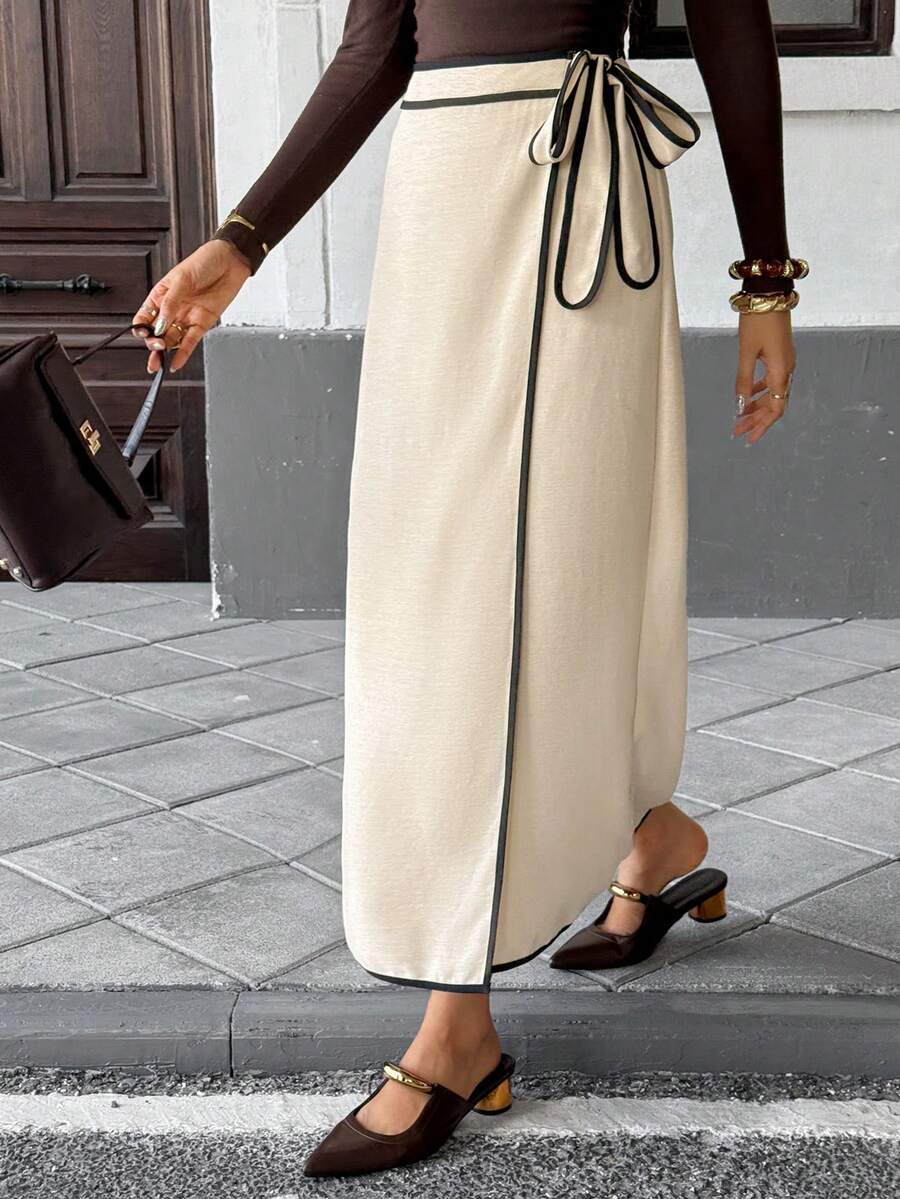 SHEIN Frenchy Nuova gonna casual lunga con fiocco laterale e profili a contrasto, adatta per l'autunno e l'inverno, per donne eleganti. Ideale per il ritorno a scuola, concerti country, casual business, insegnanti, appuntamenti, compleanni, brunch, stile western, casual business in inverno, vacanze, Capodanno - Albicocca - Visualizzare 1
