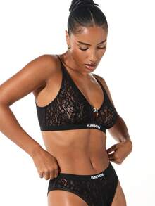 SUMWON WOMEN Bralette con cierre de encaje en el frente, escote en V profundo y patrón floral intrincado - Negro - Ver 6