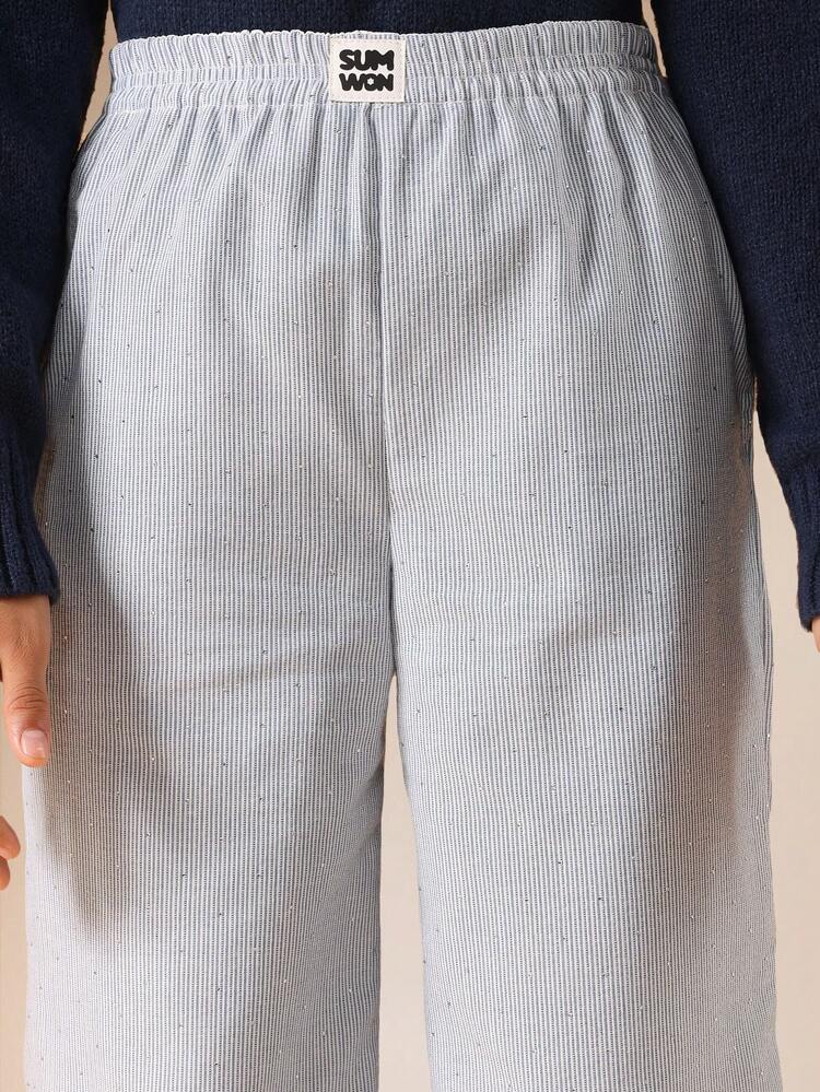 Spodnie palazzo z szerokimi nogawkami i prążkowanymi ściągaczami