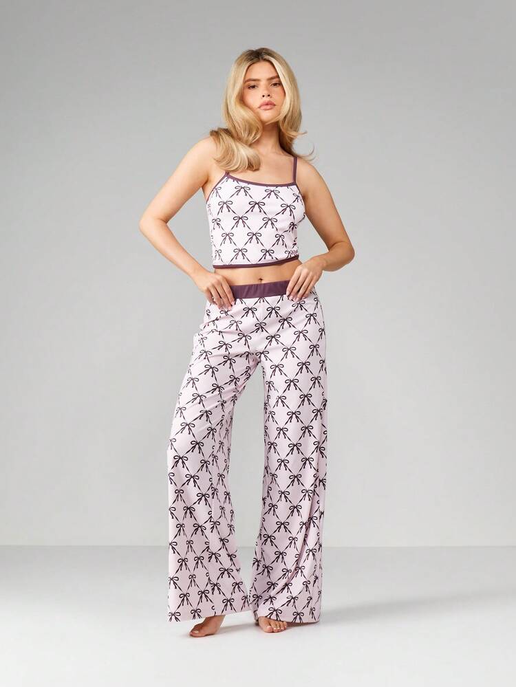 MISSGUIDED Set da lounge natalizio con stampa a fiocco, composto da canotta e pantaloni palazzo a gamba ampia, per comfort domestico