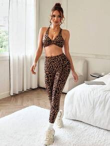 Slayoga Costum sport pentru femei cu imprimeu leopard, top și colanți, model răsucit