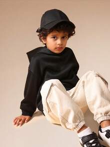 SUMWON Sudadera con capucha básica para niños y uso casual diario con bolsillo central