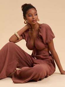 Travachic Damen einfarbiger tiefer V-Ausschnitt, sexy kurzer Jumpsuit mit Hohlmuster