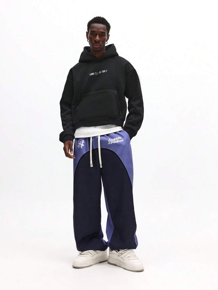 Jogginghose im Colorblock-Design mit marineblauen Einsätzen