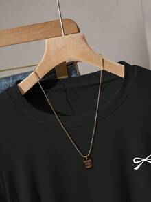 Resyla 女式蝴蝶结印花修身褶皱 T 恤，百搭时尚，适合夏季、返校、日常穿着、派对、约会，引人注目 - 黑色 - 查看 5