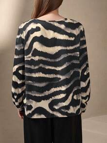 Chikora Damen Große Größen Bluse mit Zebramuster, V-Ausschnitt und Laternenärmeln, locker geschnitten