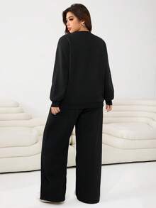 Solflare 2 件套大码休闲刺绣马刺 V 领上衣和裤子套装，秋季 - 黑色 - 查看 2