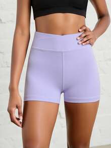SHEIN Pantalones cortos de activewear para niñas preadolescentes de unicolor, estilo minimalista casual con cintura cruzada, tela con estiramiento de 4 vías, adecuado para ciclismo, correr, entrenamiento - Morado - Ver 7