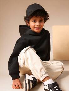 SUMWON Sudadera con capucha básica para niños y uso casual diario con bolsillo central