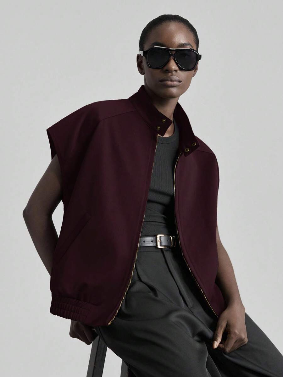 Ontre Áo khoác nữ dáng rộng cổ đứng màu trơn 2026SS, trang phục công sở thường ngày, phong cách tối giản cá tính, áo khoác mùa đông cho nữ, hơi hướng cổ điển.