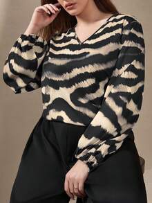 Chikora Damen Große Größen Bluse mit Zebramuster, V-Ausschnitt und Laternenärmeln, locker geschnitten