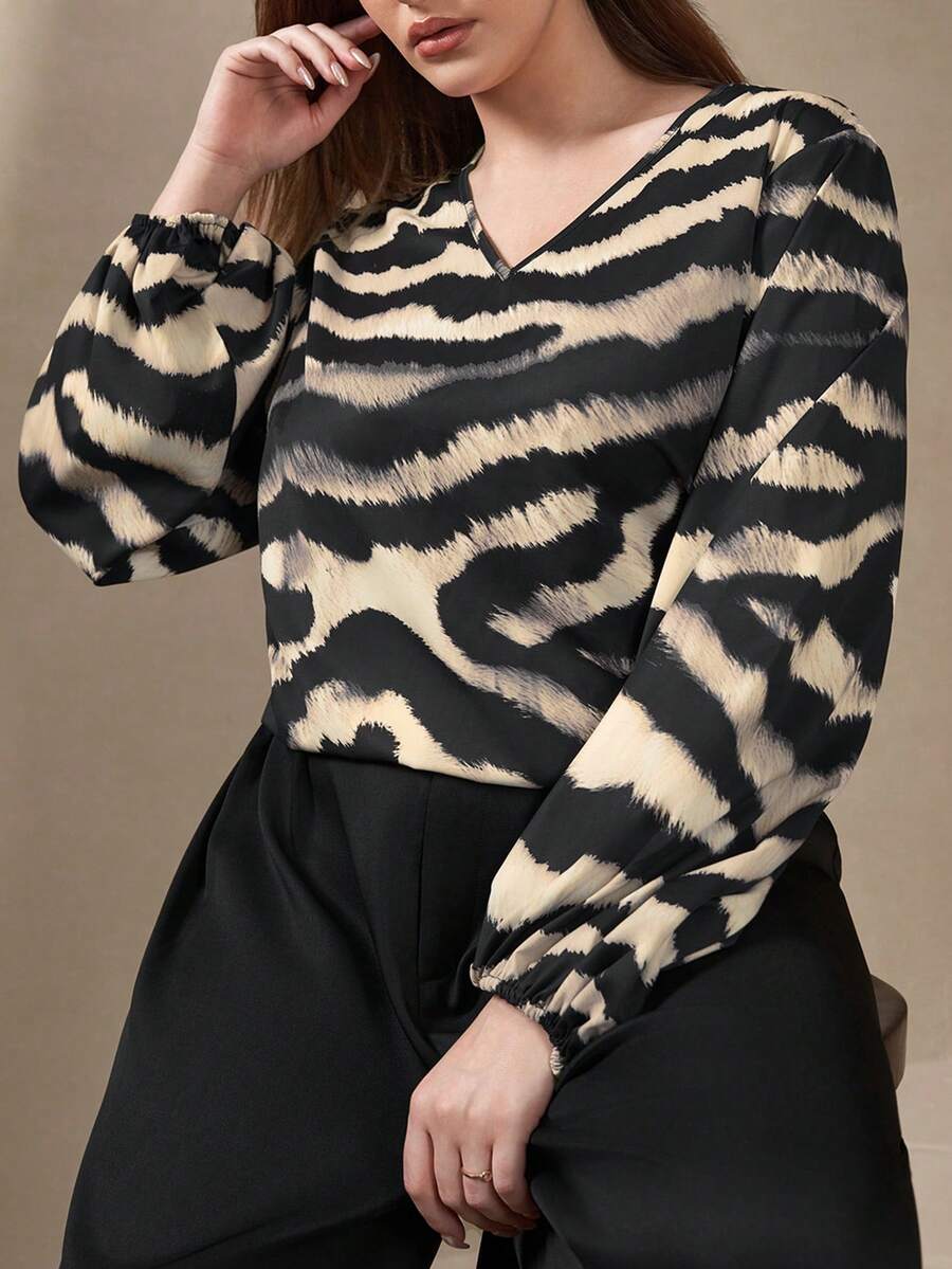 Chikora Damen Große Größen Bluse mit Zebramuster, V-Ausschnitt und Laternenärmeln, locker geschnitten