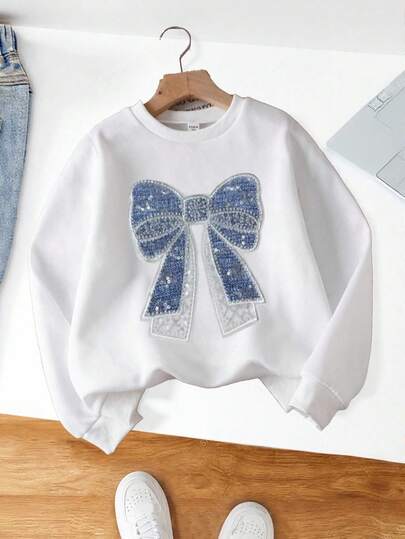 Kleine Mädchen Lässig Komfortable Mode Minimalistisch Vielseitig Kreativ Faux Pailletten Schleife Grafik Thermisch gefütterte Langarm Pullover mit Rundhalsausschnitt, Herbst Oberbekleidung