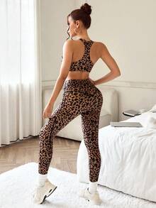 Slayoga Costum sport pentru femei cu imprimeu leopard, top și colanți, model răsucit