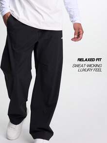 Pantalones anchos y sueltos con cintura elástica y bolsillos para hombre, otoño - Negro - Ver 1