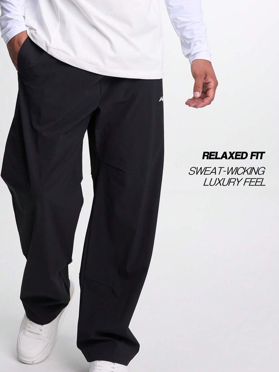 Pantalones anchos y sueltos con cintura elástica y bolsillos para hombre, otoño - Negro - Ver 1