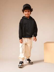 SUMWON Sudadera con capucha básica para niños y uso casual diario con bolsillo central