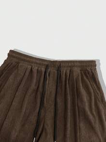 ROMWE MEN Casual 男士时尚休闲百搭灯芯绒工装裤，适合日常休闲穿着、周末出游、户外活动、旅行、朋友聚会等场合。这款裤子是男士衣橱中不可或缺的百搭单品，也是送给男朋友或老公的绝佳礼物。 - 咖啡棕 - 查看 3