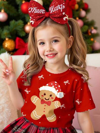 SHEIN 小女孩圣诞快乐，红色圣诞庆典，可爱姜饼人，圣诞帽，迷你蝴蝶结印花，休闲简约圆领短袖T恤，适合圣诞派对、红色新年、居家、拍照、假日、圣诞氛围、圣诞礼物、轻松舒适、时尚宝贝、休闲装、圣诞图案、新年、新风格、返校节、时尚圣诞