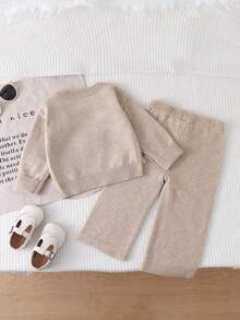 SHEIN Playful Pals Baby Girls Sweater Co-Ords, Champagne Color, Handmade 3D Bow Decor Round Neck Pullover Sweater And Wide Leg Pants Knit Set, Soft And Comfortable, Suitable For Daily, Outdoor, Travel, Vacation, Home, Daycare And Baby Girl Play Wear, Autumn/Winter Bow Baby Clothes Baby Girl Sweaters Set Beige Baby Girl Clothes Elegant Tops For Baby Girl Knit Two Pieces - Apricot - View 2