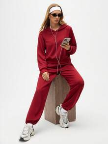 Eassivo Eassivo Tuta sportiva da donna con felpa con cappuccio a maniche raglan e tasche, e pantaloni di colore unito - Bordò - Visualizzare 4