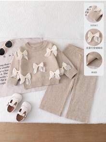 SHEIN Playful Pals Baby Girls Sweater Co-Ords, Champagne Color, Handmade 3D Bow Decor Round Neck Pullover Sweater And Wide Leg Pants Knit Set, Soft And Comfortable, Suitable For Daily, Outdoor, Travel, Vacation, Home, Daycare And Baby Girl Play Wear, Autumn/Winter Bow Baby Clothes Baby Girl Sweaters Set Beige Baby Girl Clothes Elegant Tops For Baby Girl Knit Two Pieces - Apricot - View 8
