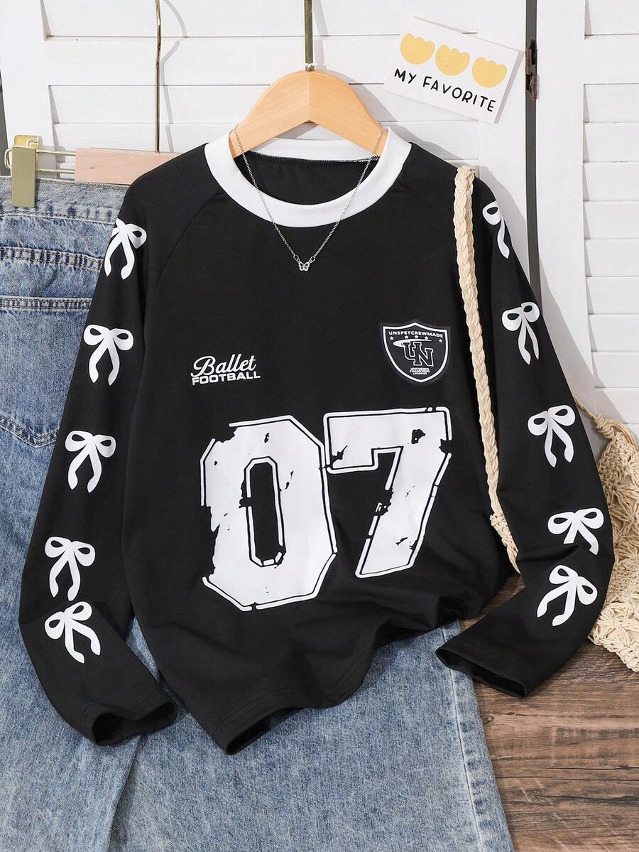 SHEIN Áo thun dài tay dáng rộng kiểu Mỹ dành cho bé gái tuổi teen, chất liệu mềm mại thoải mái, phù hợp cho thể thao, mặc thường ngày, đi học, chụp ảnh, du lịch và nhiều dịp khác, nhẹ nhàng, là món đồ không thể thiếu cho các bé gái tuổi teen sành điệu. - màu đen - Xem 1