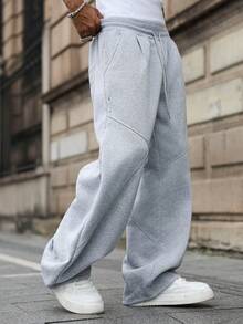 Manfinity EMRG 男士纯色抽绳腰带口袋休闲阔腿运动裤 男士灰色喇叭运动裤 宽松运动裤 男士宽腿运动裤 男士喇叭运动裤 男士喇叭运动裤 灰色慢跑裤 灰色宽松运动裤 - 淺灰色 - 查看 5