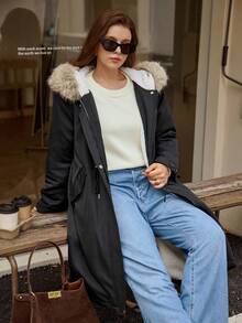 Easura Abrigo largo de invierno para mujer talla grande con mangas largas, capucha y cuello de piel desmontable, y bajo asimétrico