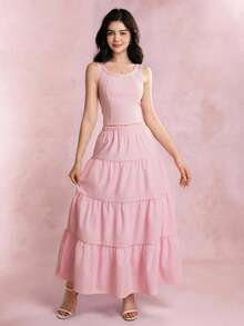 青少年（女孩）两件套服装，春夏休闲优雅，包括粉色无袖蝴蝶结吊带衫和粉色长裙