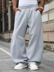 Manfinity EMRG 男士纯色抽绳腰带口袋休闲阔腿运动裤 男士灰色喇叭运动裤 宽松运动裤 男士宽腿运动裤 男士喇叭运动裤 男士喇叭运动裤 灰色慢跑裤 灰色宽松运动裤 - 淺灰色 - 查看 4