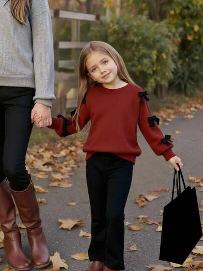 2件套年轻女孩简约时尚粉色蝴蝶结黑色上衣和粉色裤子运动服套装