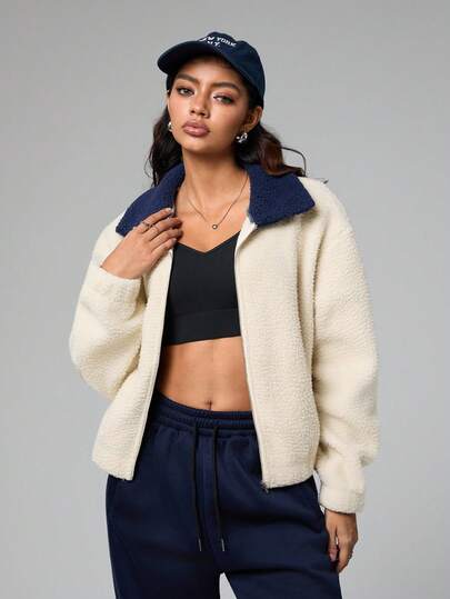 Dewbera Chaqueta de golf con cuello de contraste, forro térmico y bolsillo con cremallera para mujer, ropa deportiva casual para uso diario, ropa deportiva para mujer, chaqueta de entrenamiento corta de mujer, ropa de gimnasio para mujer, chaqueta oversize de mujer para actividades deportivas