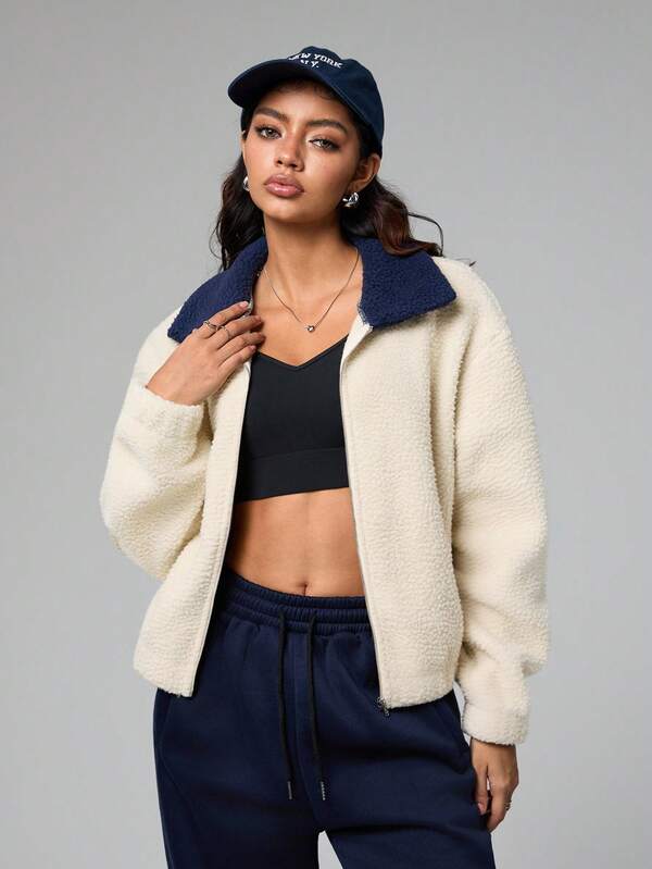 Dewbera Veste de golf à col contrasté, doublée thermique, avec poches zippées. Vêtement de sport casual pour un port quotidien. Veste de sport courte pour femmes, tenue de sport, vêtements de gym pour femmes, coupe oversize