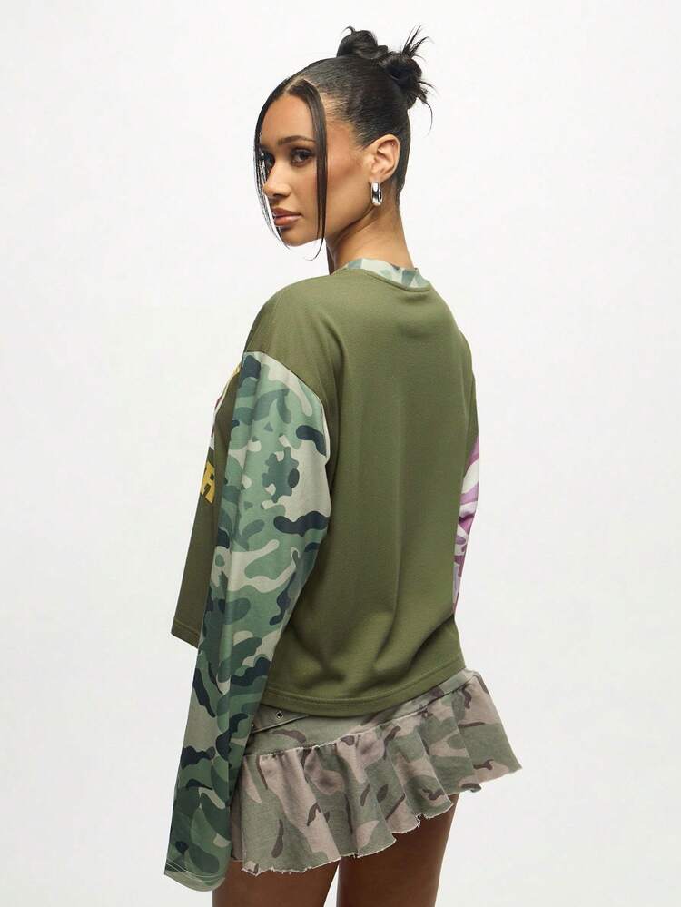 SUMWON WOMEN Fly Girl Forever 94 Camo Long Sleeve Graphic T Shirt Ruffled Raw Hem Rugged Military Inspired Street Style Casual Autumn Winter Top