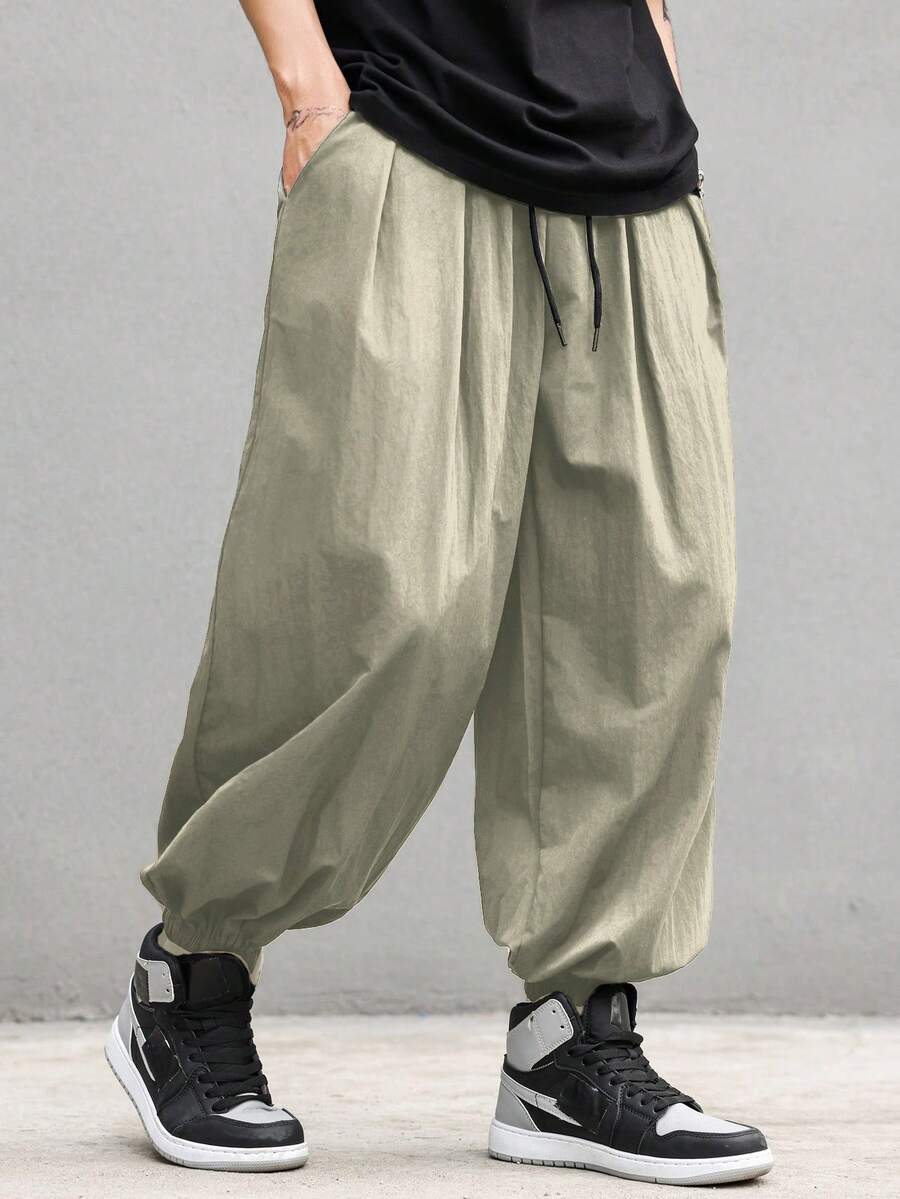 Manfinity EMRG Quần ống rộng cạp chun có túi xếp ly cho nam - Xám - Xem 1